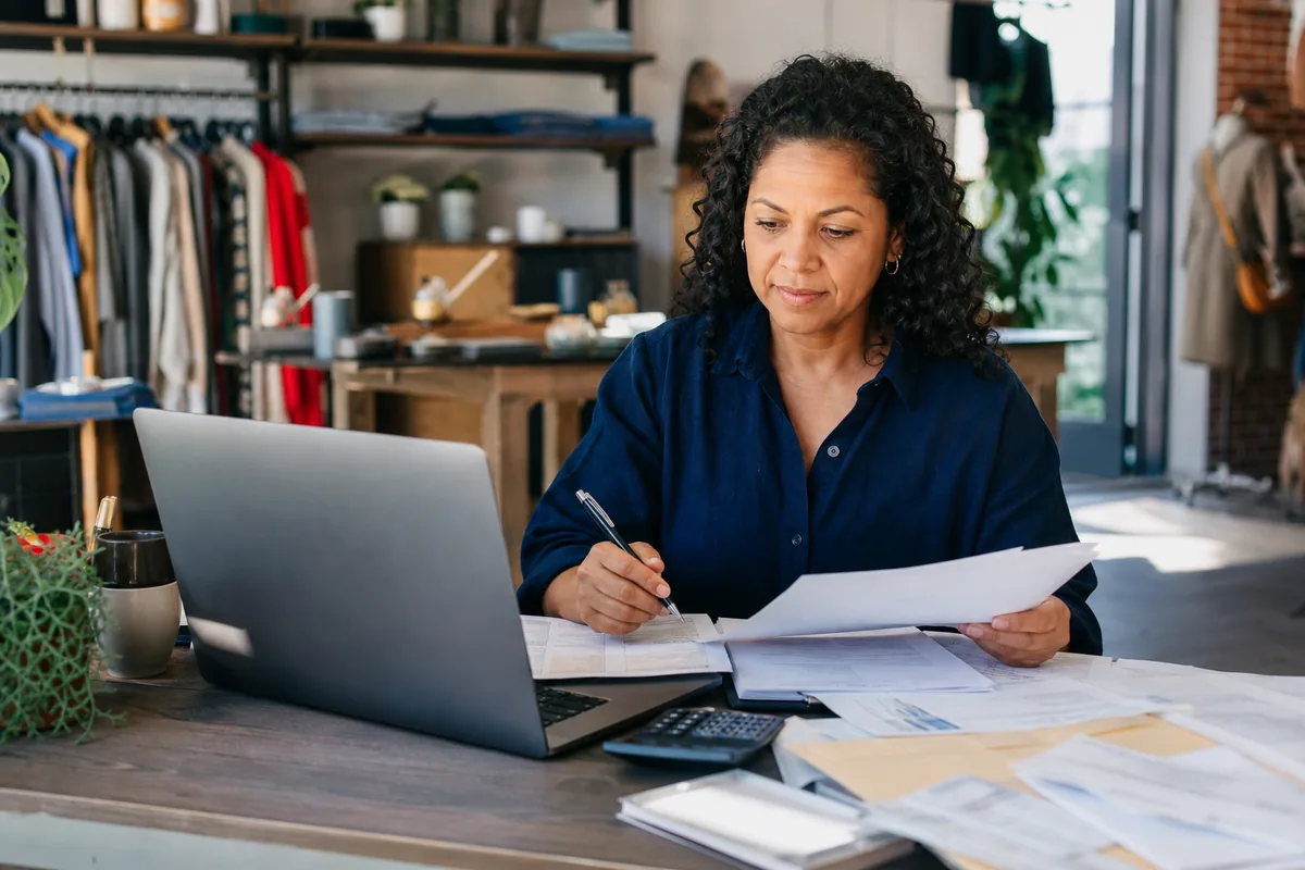 Small-business owner reviewing funding options after a credit setback.